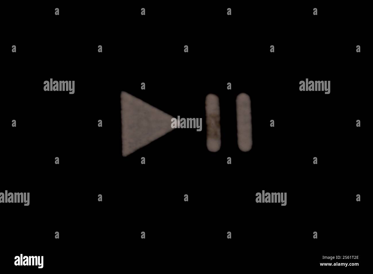 Play pause track song episode symbol in white with black background Stock Photo
