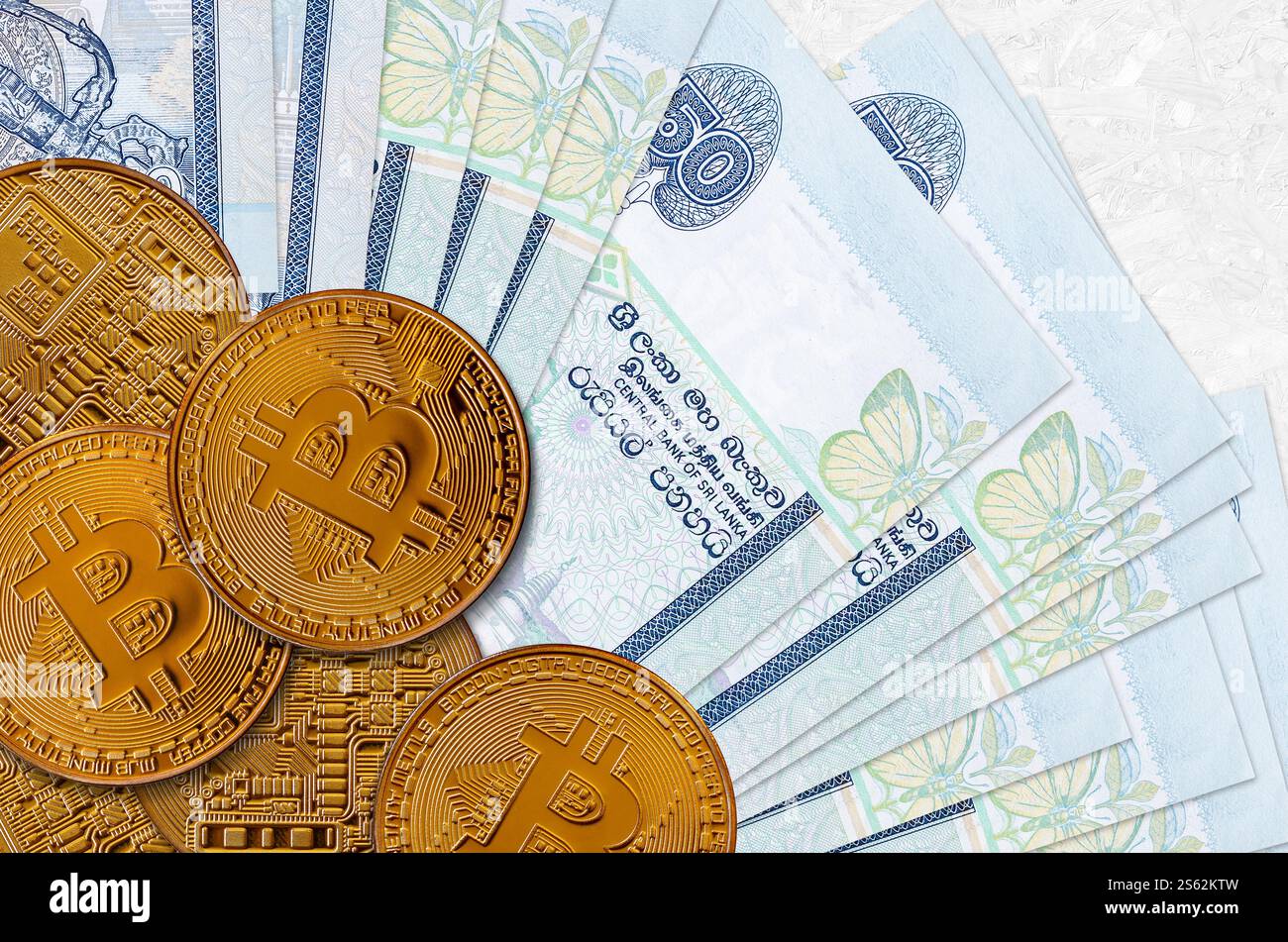 50 Sri Lankan rupees bills and golden bitcoins. Cryptocurrency investment  concept. Crypto mining or trading transactions. 50 Sri Lankan rupees bills  Stock Photo - Alamy