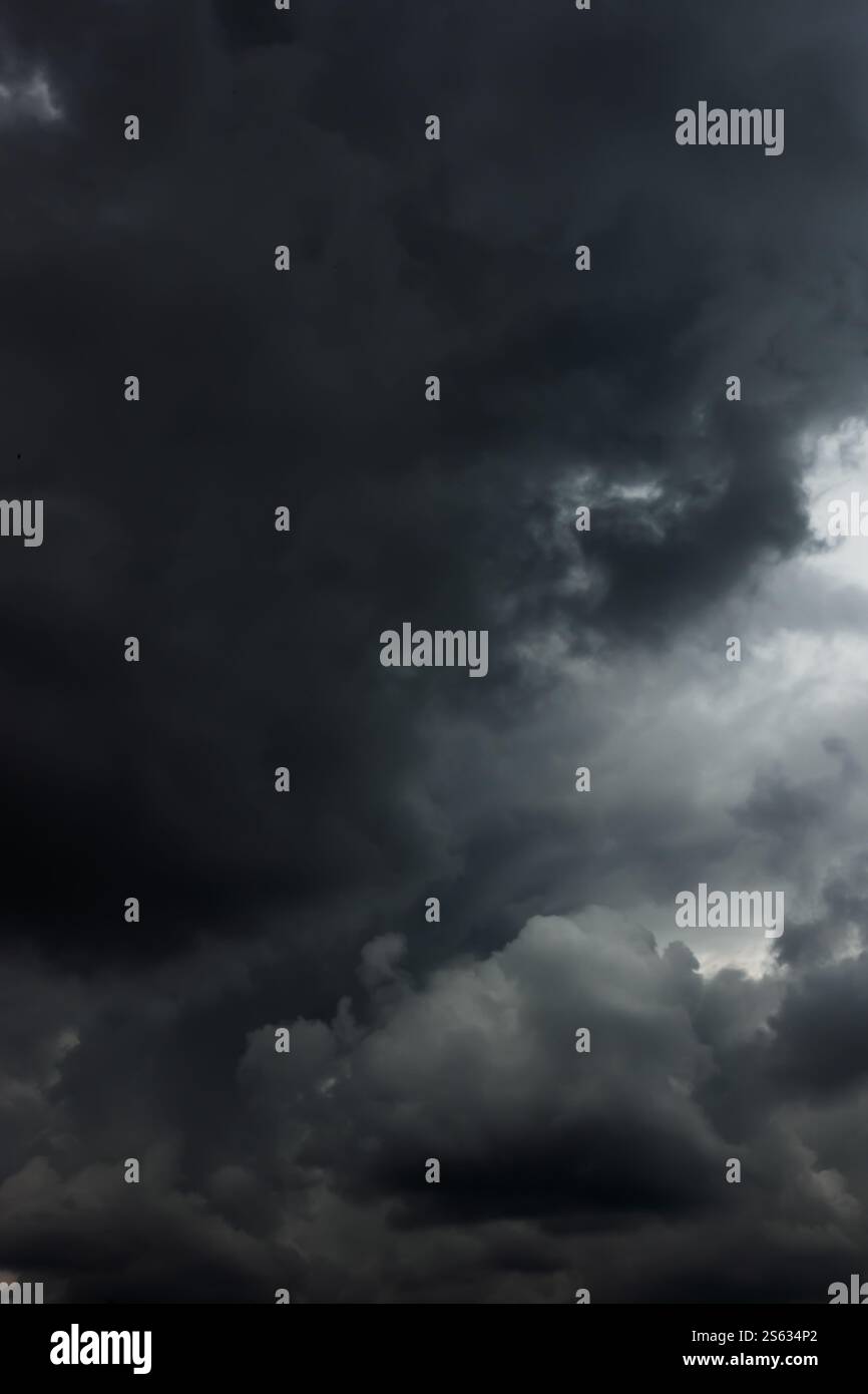 Dramatic sky with dark stormy rainclouds, may be used as background Stock Photo
