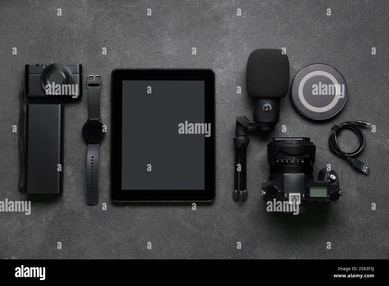 Set of different gadgets on dark background Stock Photo