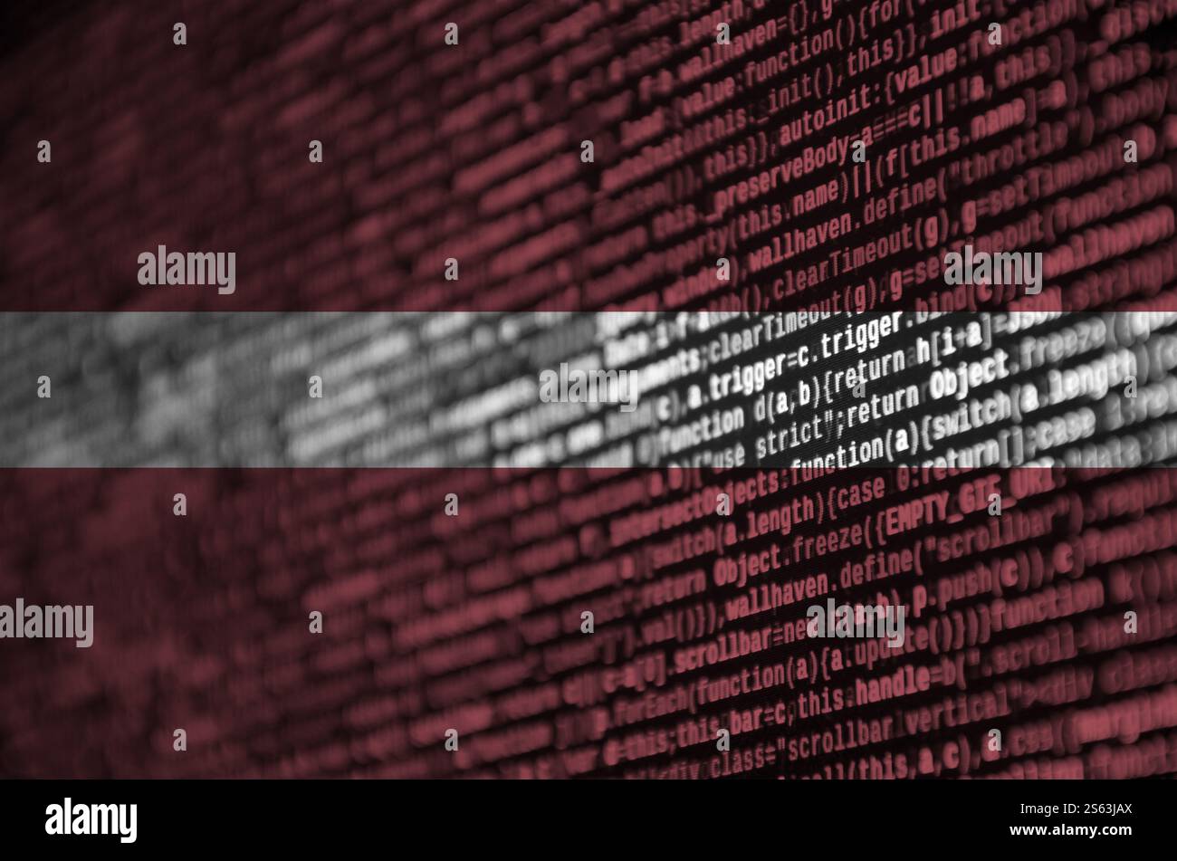 Latvia flag is depicted on the screen with the program code. The concept of modern technology and site development. Latvia flag is depicted on the Stock Photo