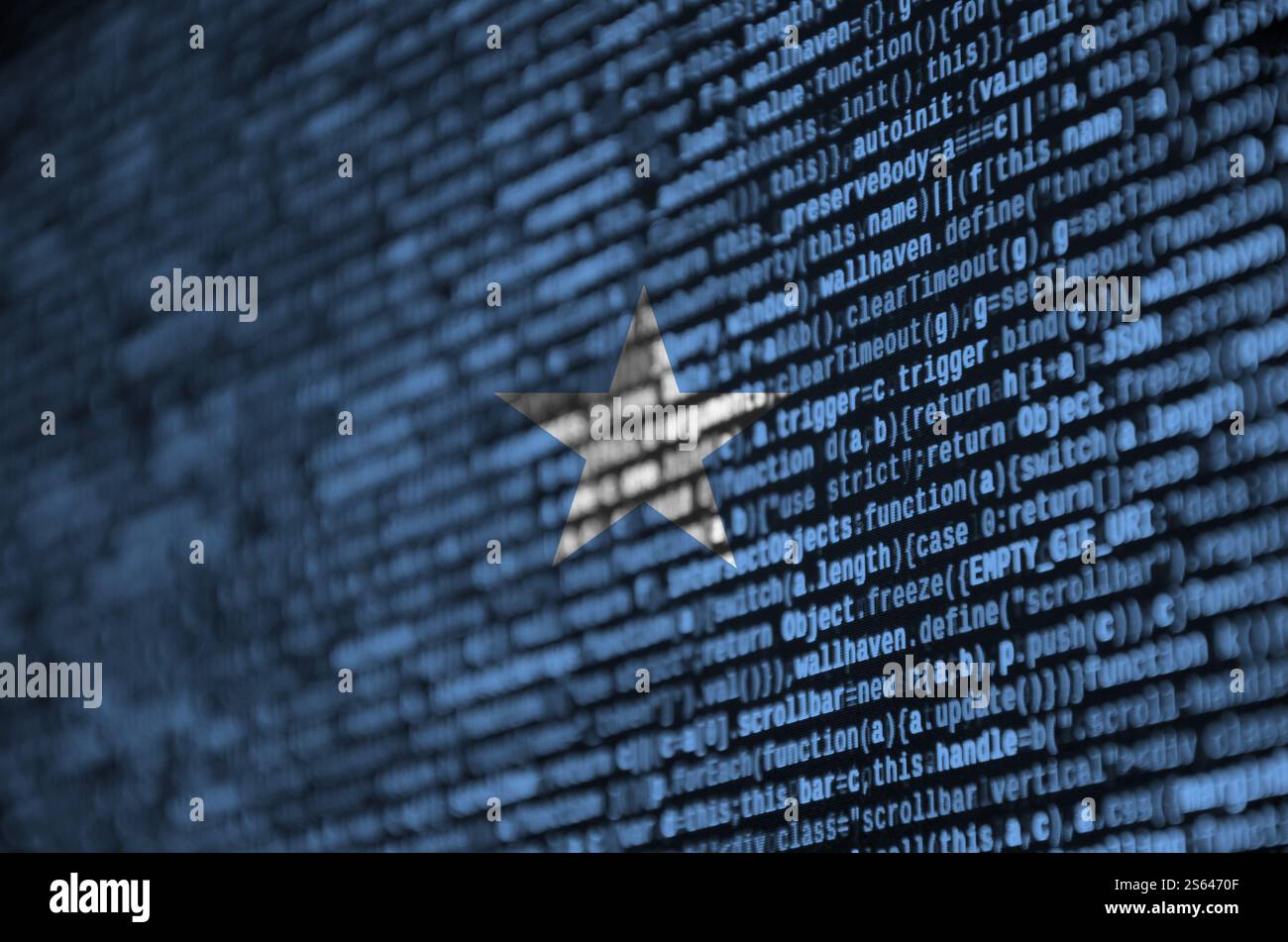 Somalia flag is depicted on the screen with the program code. The concept of modern technology and site development. Somalia flag is depicted on the Stock Photo
