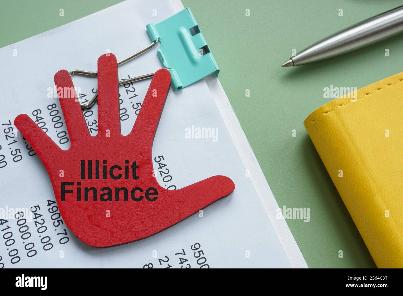 Accounting report marked with illicit finance. Stock Photo