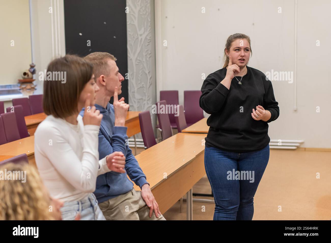 Students learn sign language at university Stock Photo - Alamy