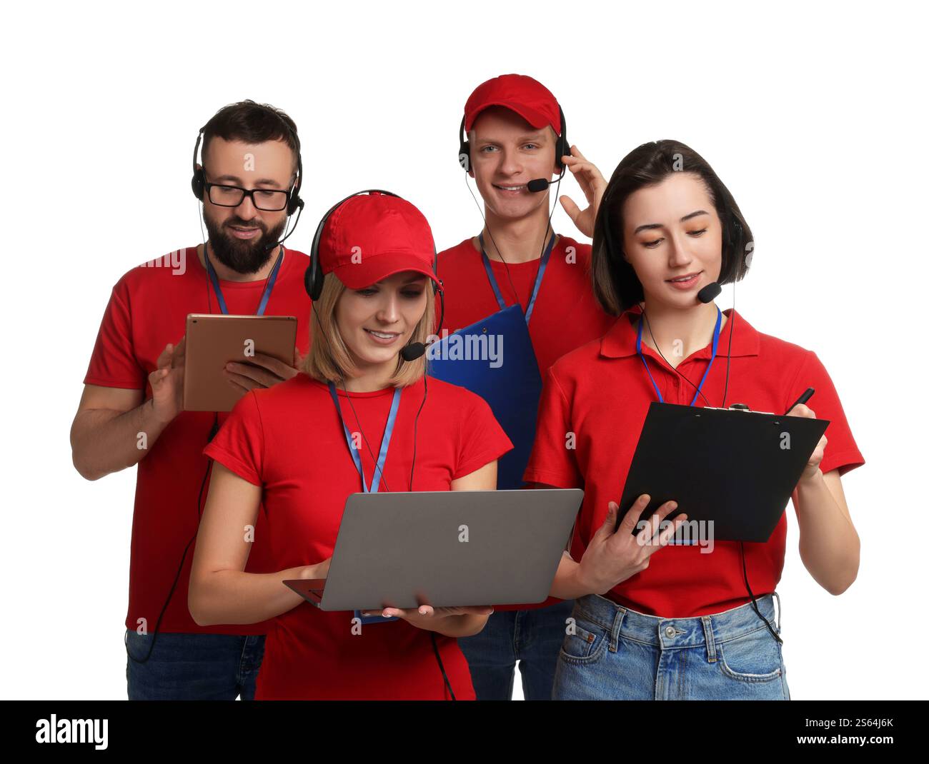 Technical support call center. Team of friendly operators working on ...