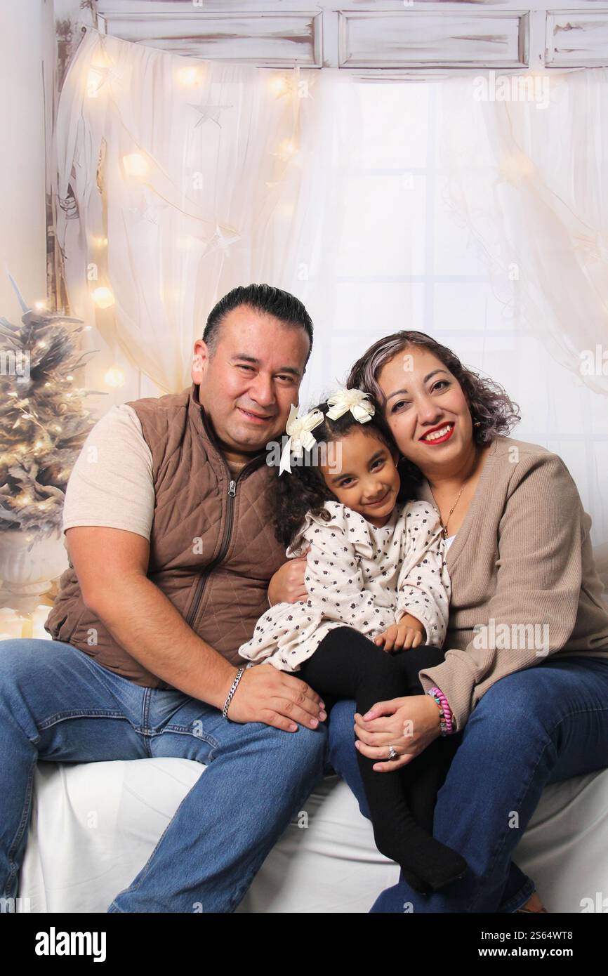 Darkskinned Latino family of dad, mom