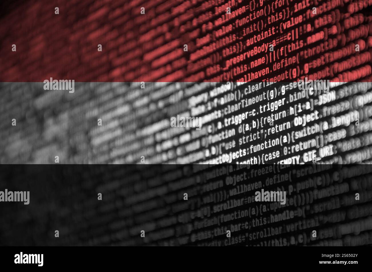 Yemen flag is depicted on the screen with the program code. The concept of modern technology and site development. Yemen flag is depicted on the Stock Photo