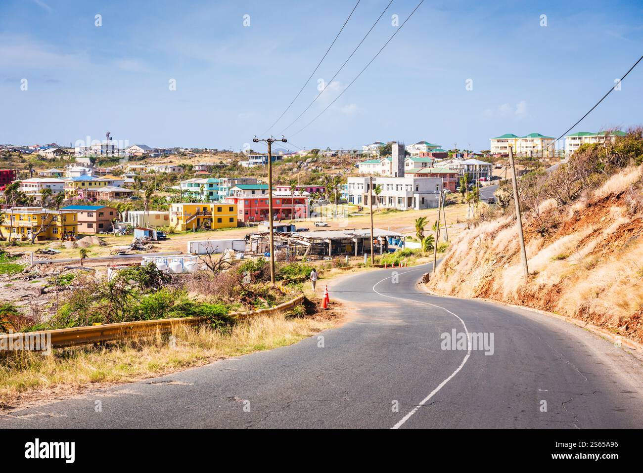 Virgin Gorda, BVI - March 22, 2018: Downhill view of Sound Road, the main connecting street on the island of Virgin Gorda. Stock Photo