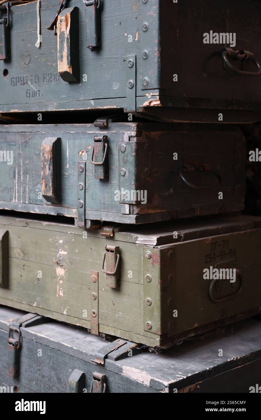 Soviet army ammunition stack of green crates with russian names of ammo ...
