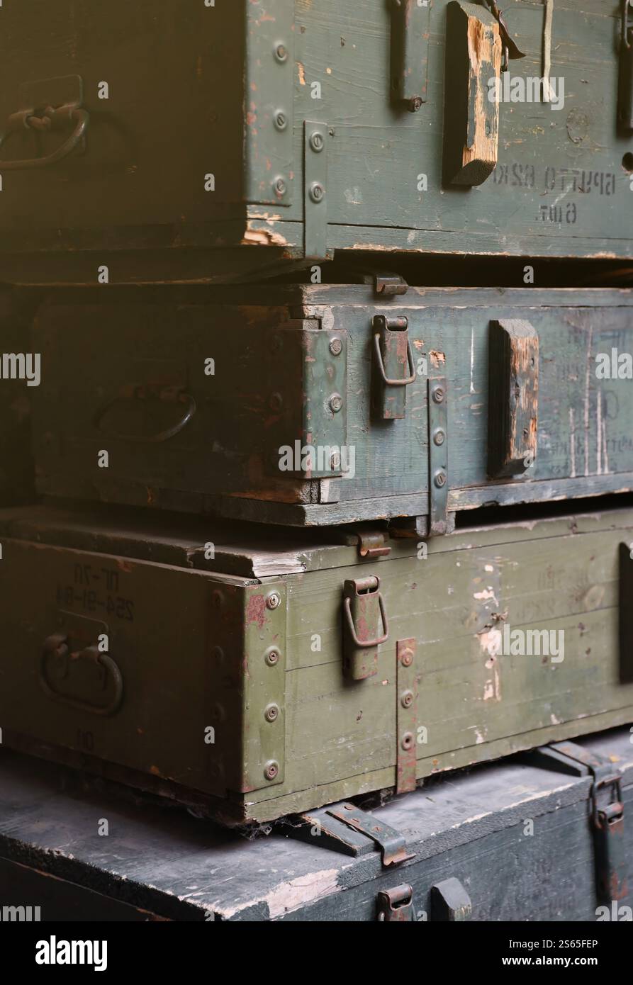 Soviet army ammunition stack of green crates with russian names of ammo ...