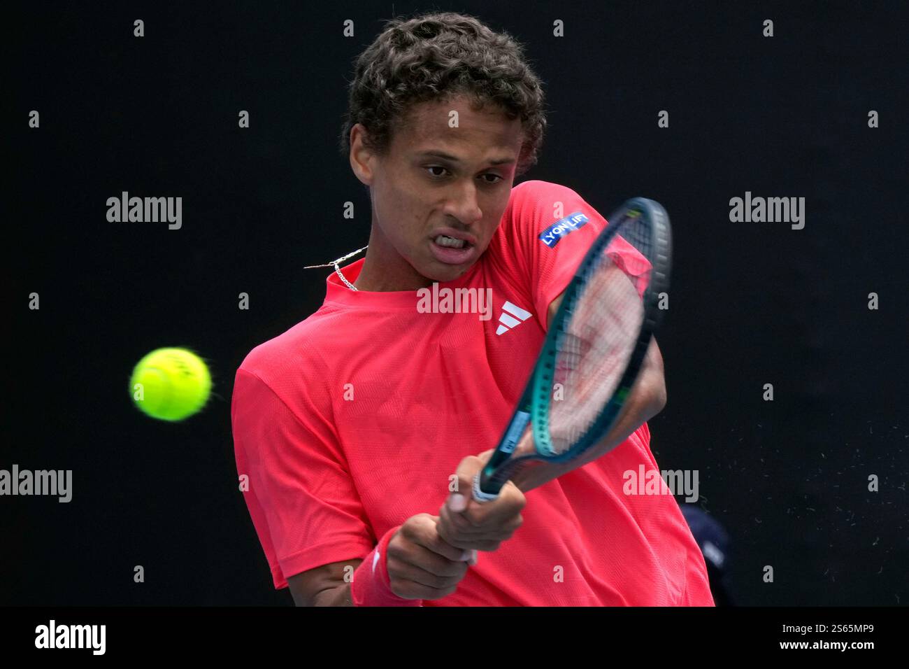 Gabriel Diallo of Canada plays a backhand return to Karen Khachanov of