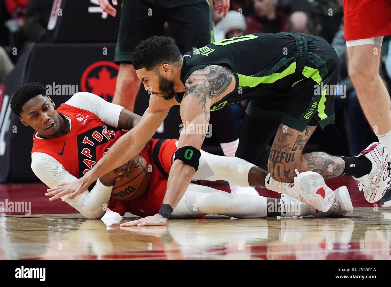 Tatum Raptors Toronto, Canada. 15th Jan, 2025. Toronto Raptors' RJ Barrett (left) and ...