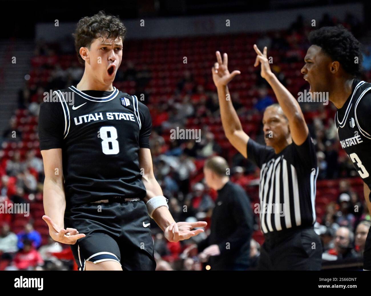 Utah State guard Drake Allen (8) reacts after a 3-point basket during ...