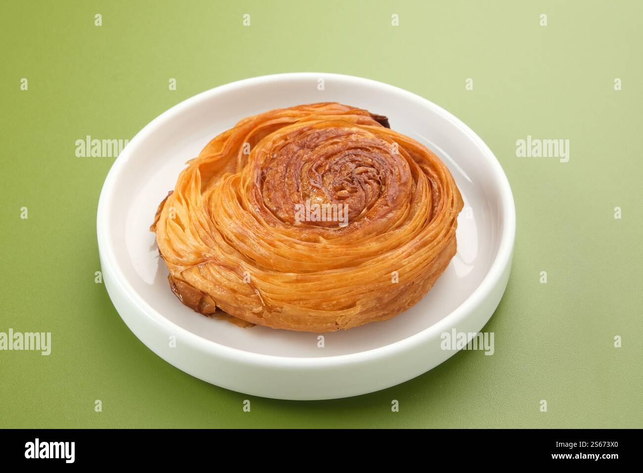 Kouign Amann, pastry with a layer of sweet caramel with a crunchy texture Stock Photo