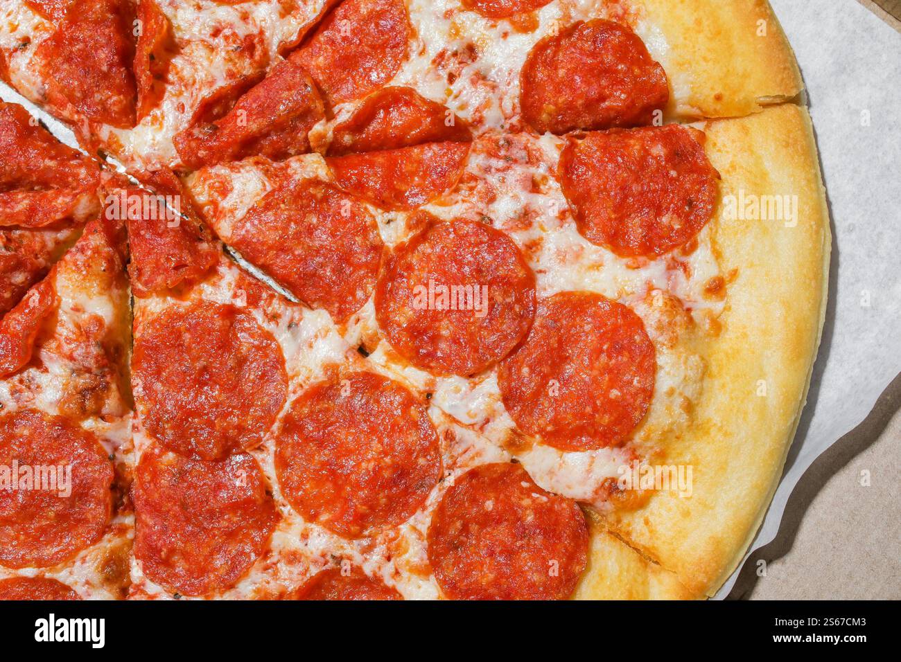 Pepperoni Pizza on a Box Stock Photo