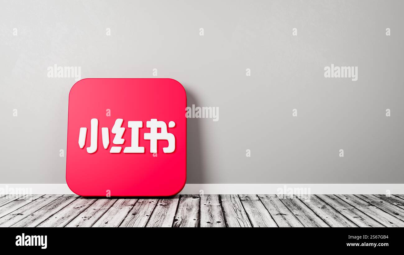 Rednote, Xiaohongshu App Icon on Wooden Floor Against Wall Stock Photo ...
