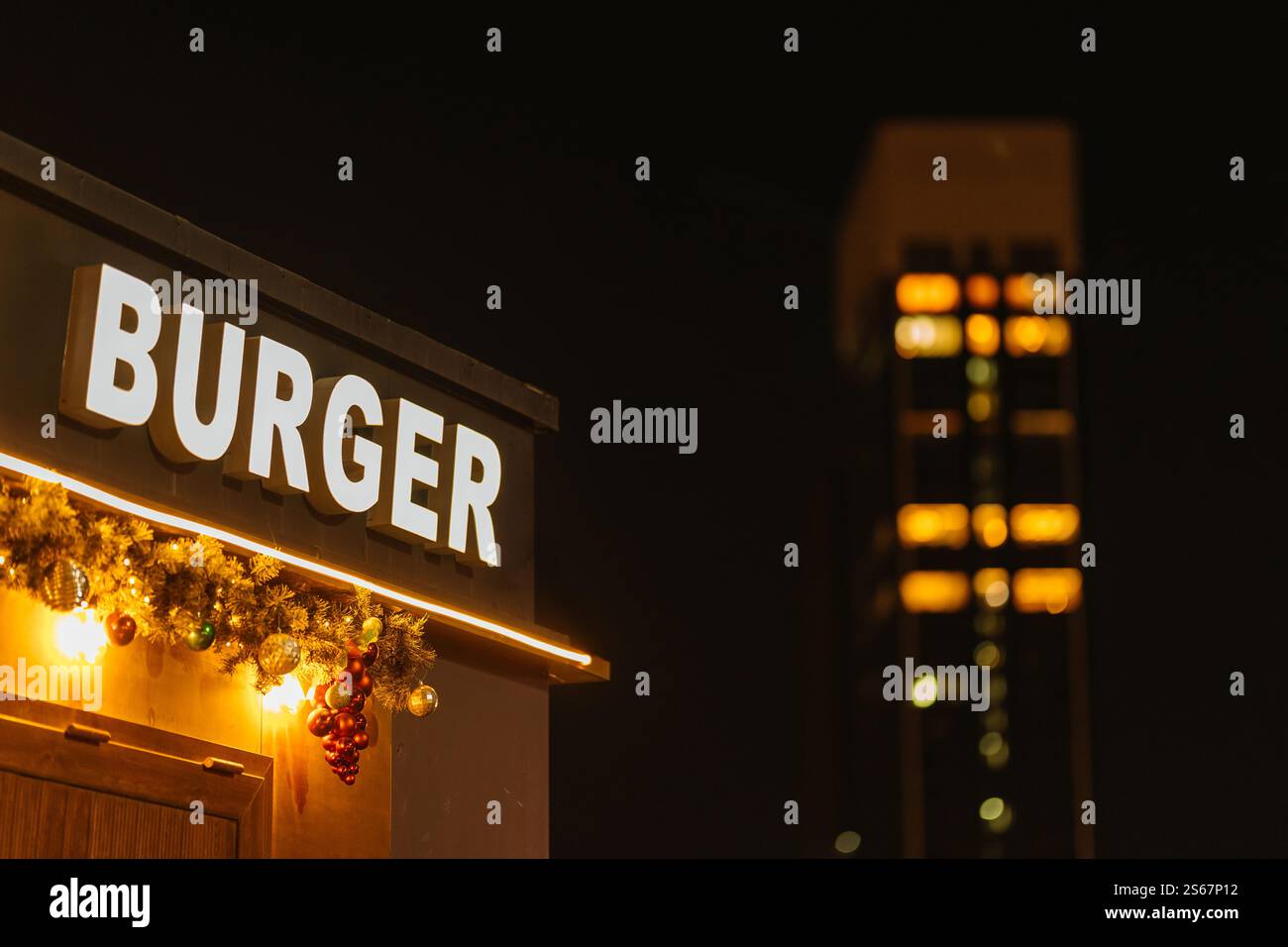 advertising sign burger. sign to attract customers to hot fast food. advertising burger Stock Photo