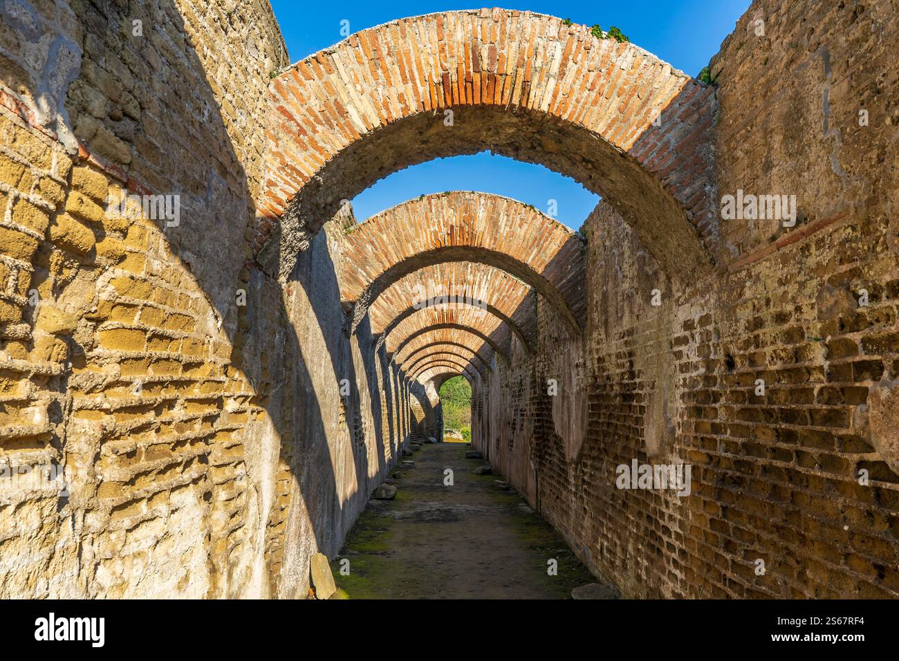 Picturesque arched corridor leading into the Baths of Mercury.: Archaeological Park of Baia said Roman Baths of Baia Stock Photo
