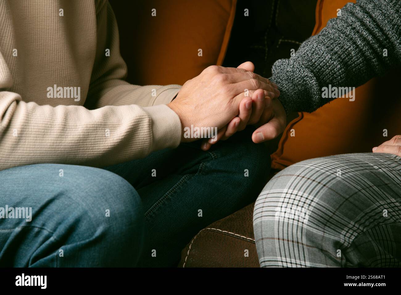 Two gay men holding hands hi-res stock photography and images - Alamy