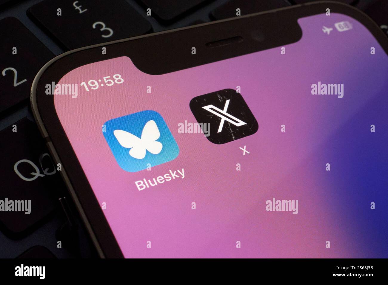 Bluesky vs. X The Battle of Social Media Titans Stock Photo Alamy