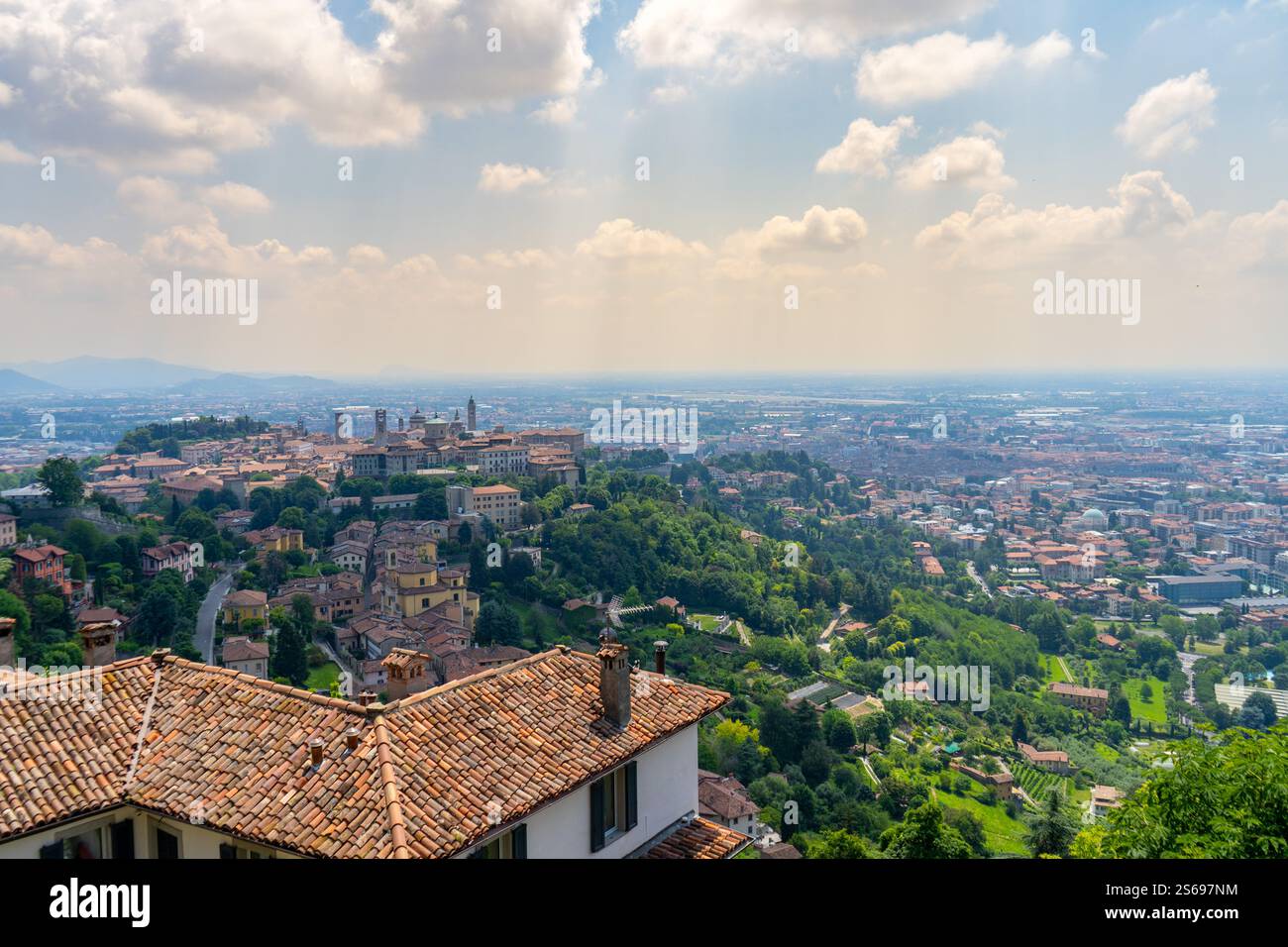 View of A breathtaking view of a historic city blending terracotta rooftops ...