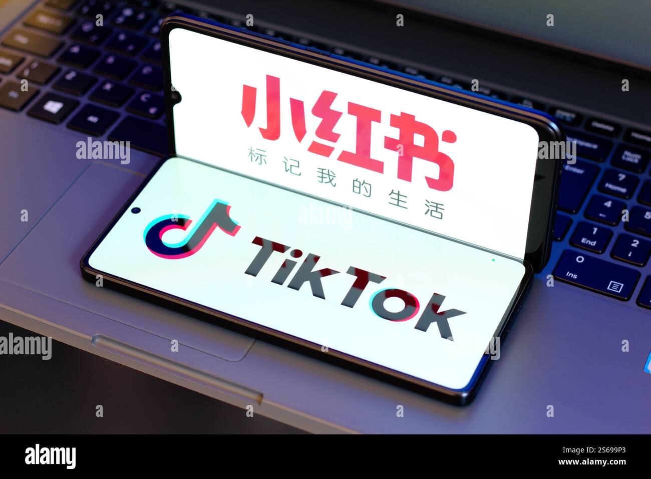 In this photo illustration, the Xiaohongshu (Rednote) and TikTok logos ...