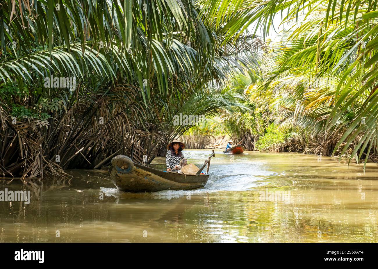Vietnamese Woman ina rowing boat, Mekong Delta, Vietnam Stock Photo - Alamy