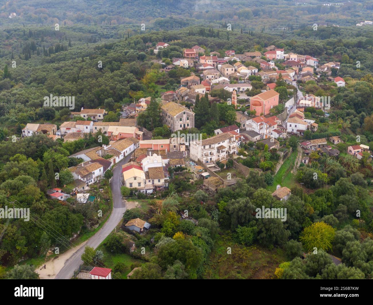 Aerial view of a quaint village nestled amidst lush greenery Stock ...