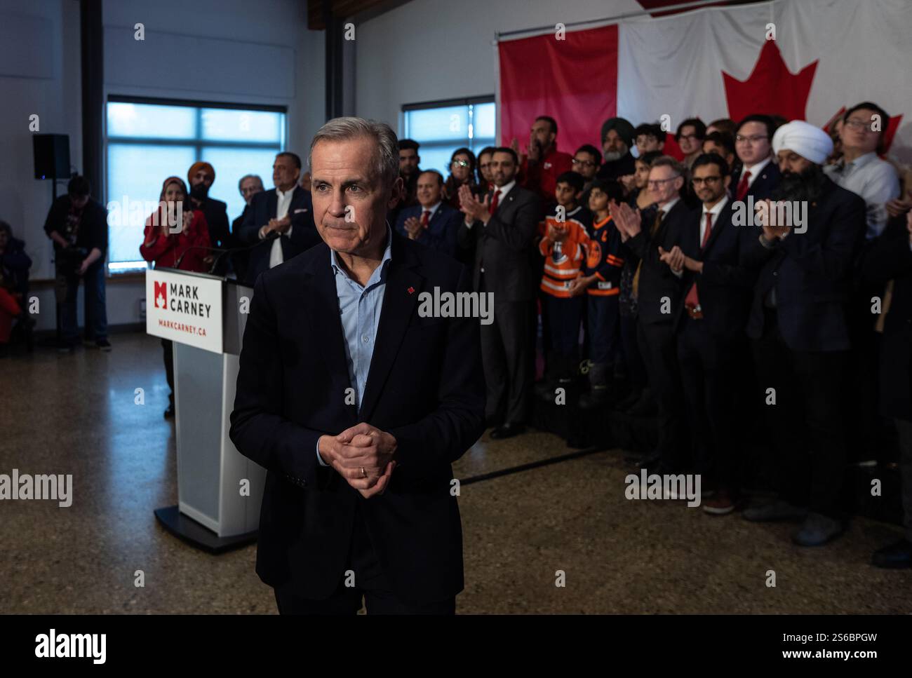 Mark Carney leaves after his Liberal leader campaign launch in Edmonton