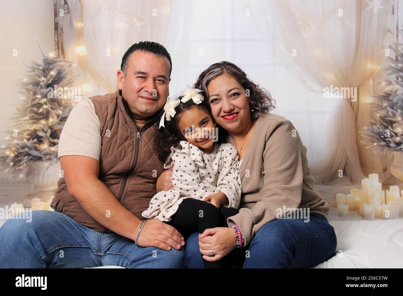 Darkskinned Latino family of dad, mom