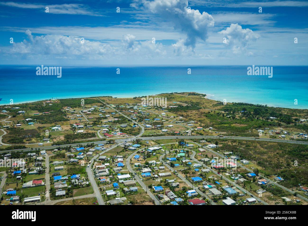 Aerial view of Saint Croix, roof tops covered with blue tarps, after Hurricane Irma and Hurricane Maria devastated the island. Stock Photo
