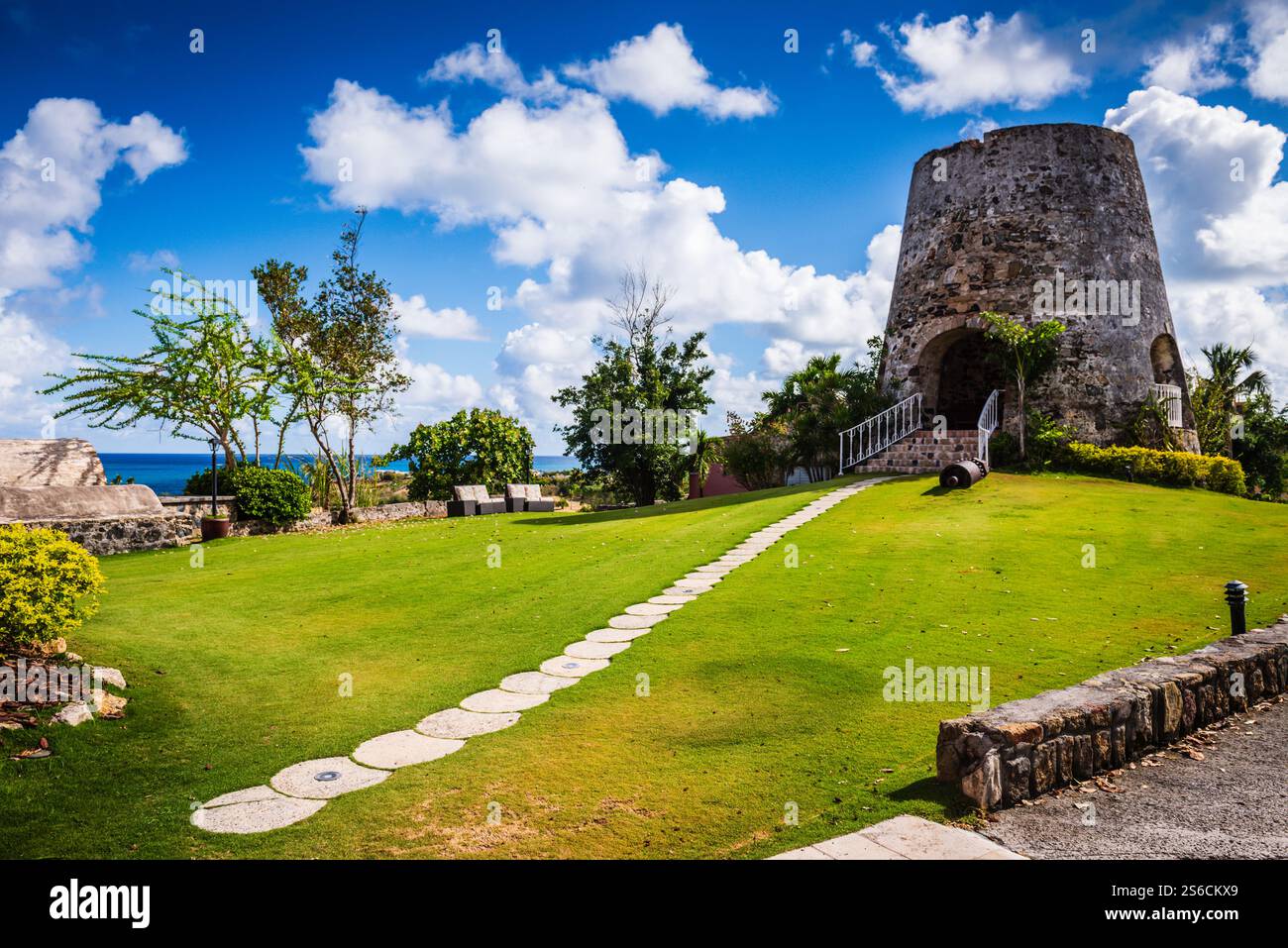 St. Croix, USVI USA - March 28, 2018: Historic sugar cane mill is a prominent feature of the luxury hotel, The Buccaneer, in Saint Croix, US Virgin Is Stock Photo