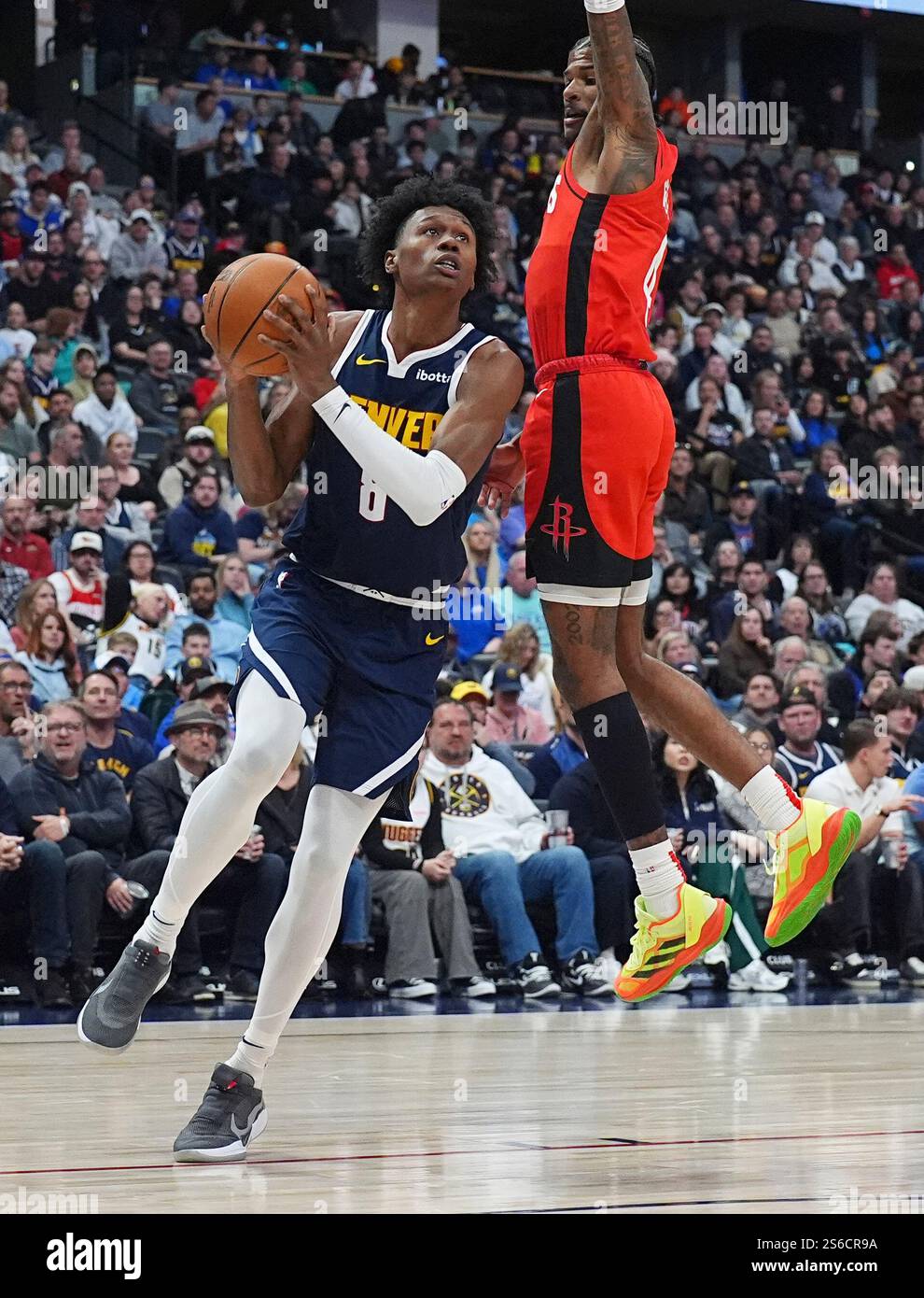 Denver Nuggets forward Peyton Watson (8) and Houston Rockets guard ...