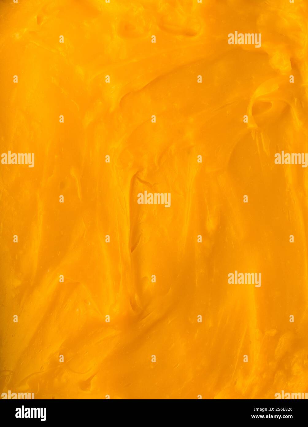close-up of vibrant yellow custard pudding surface, food background of smooth soft dessert with creamy and natural sweetness Stock Photo