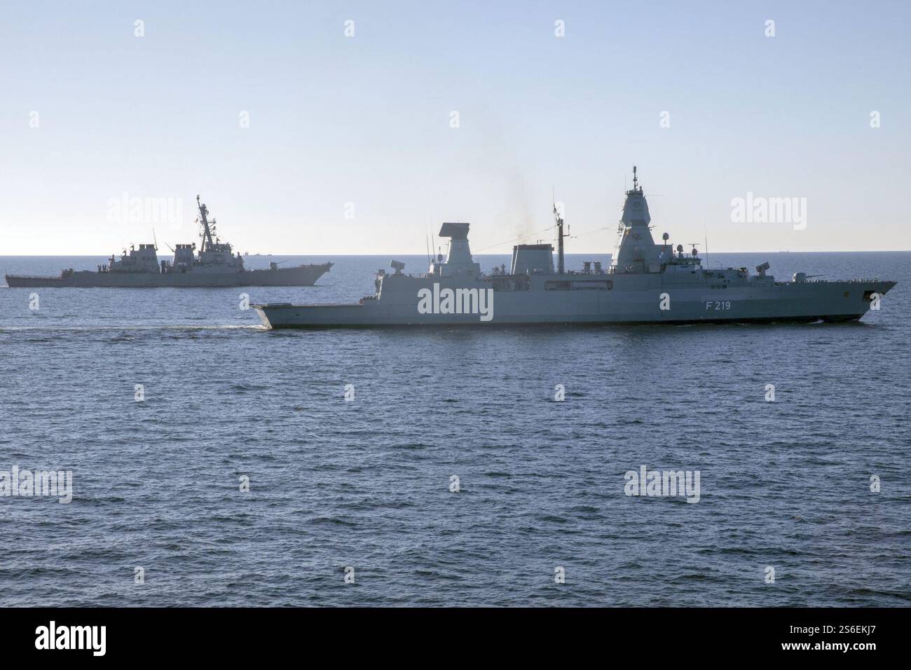 German frigate Sachsen (F219) and USS Donald Cook (DDG-75) underway in ...