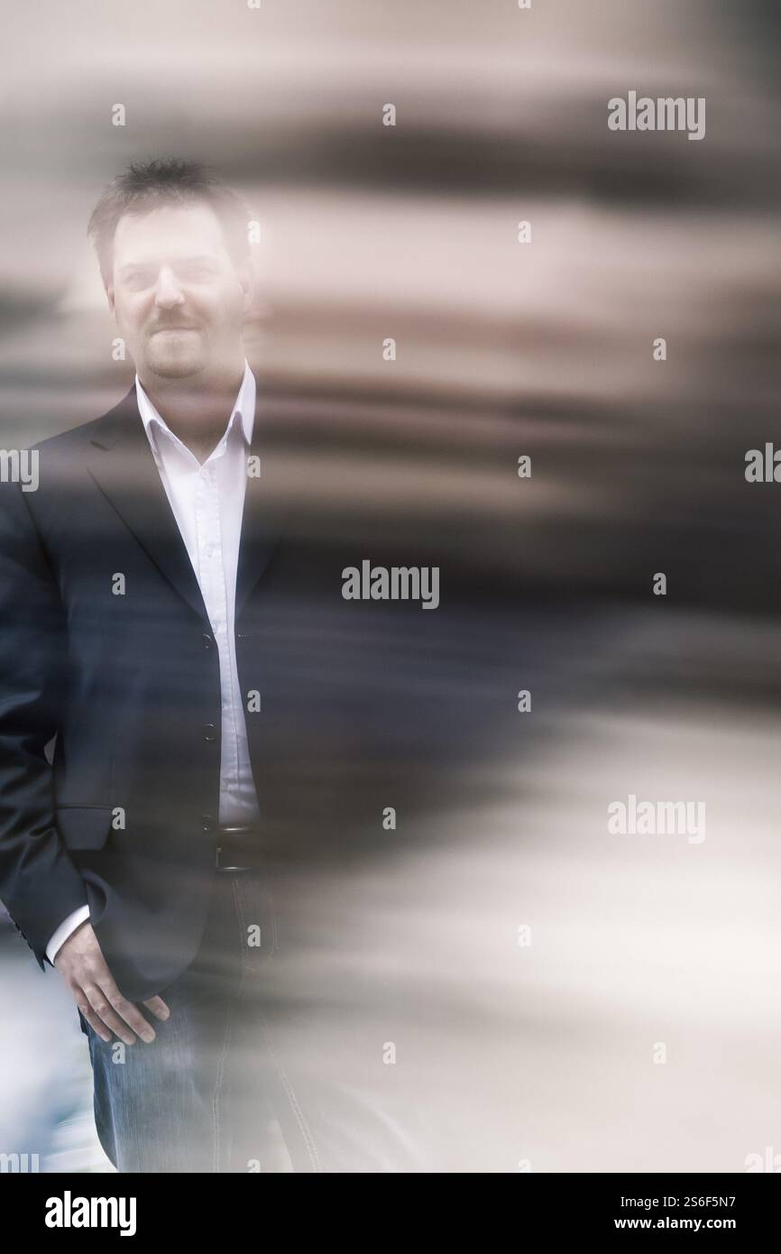 An image of a man covered in an motion blur Stock Photo - Alamy