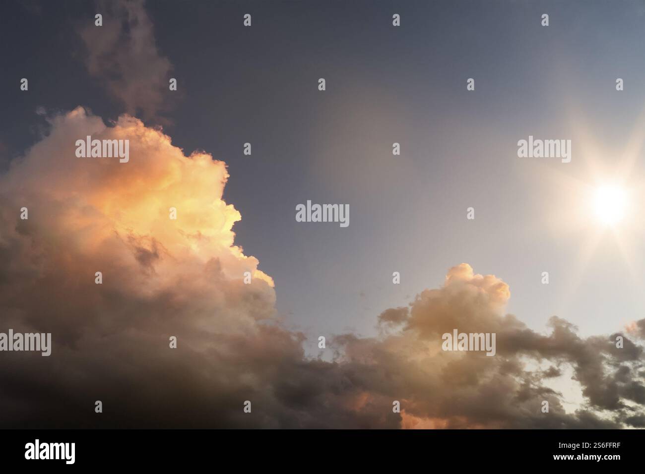 An image of a sunset sky with colorful cloud Stock Photo - Alamy