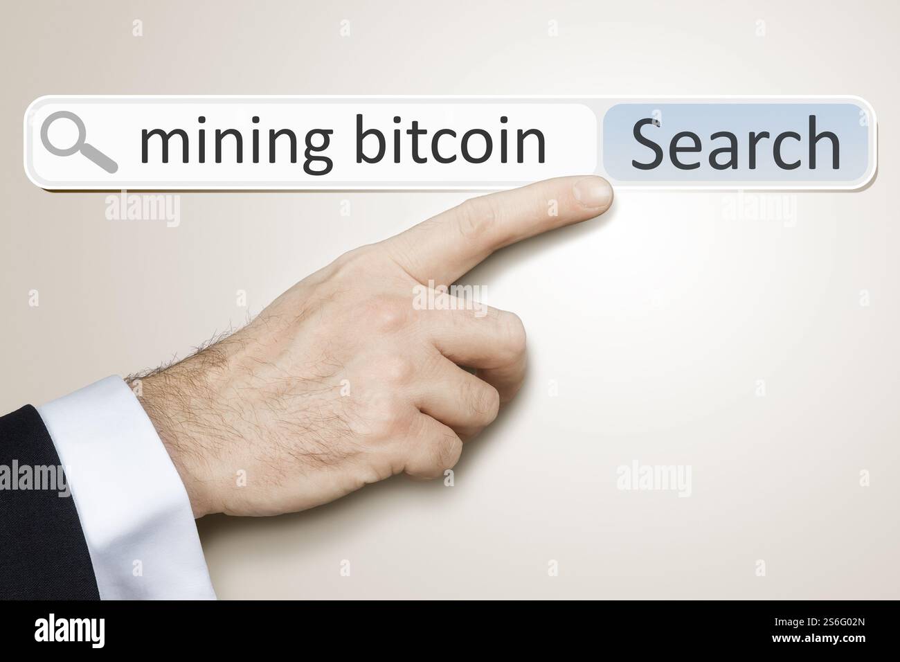 An image of a man who is searching the web for mining bitcoin Stock Photo