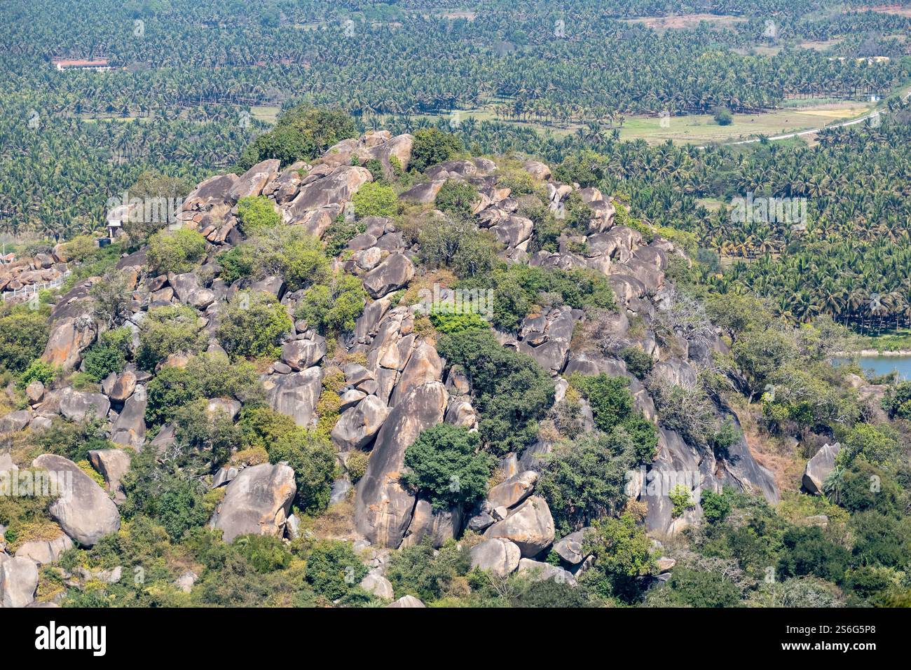 A rocky hillock formed of rocks and boulders in the countryside around ...