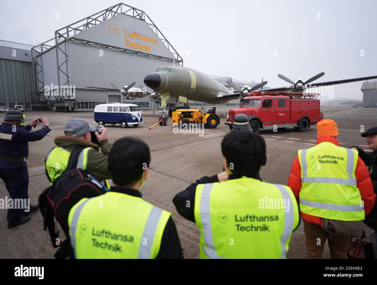 Hamburg, Germany. 17th Jan, 2025. Firefighters in historic uniforms and ...
