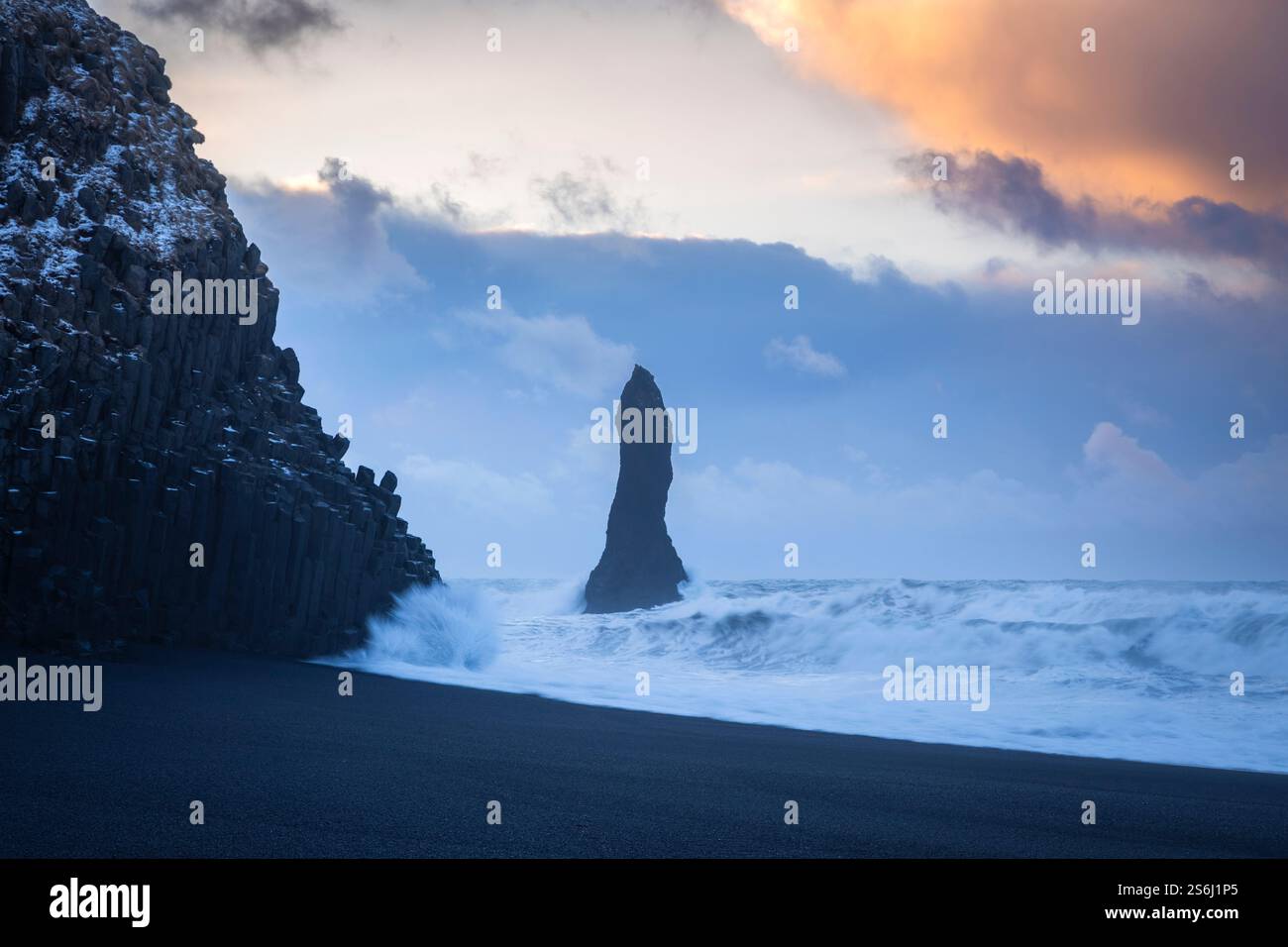 View of the basaltic columns and Reynisdrangar at Reynisfjara beach ...