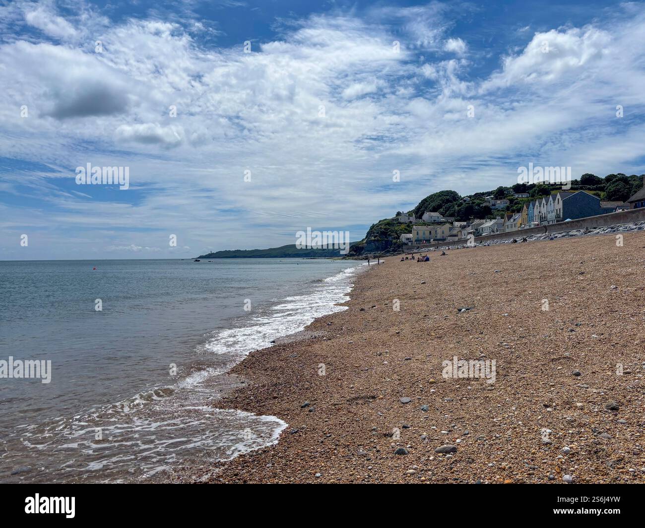 The beautiful shingle beach at Torcross on a sunny summers day, - Smartphone Captured Stock Image