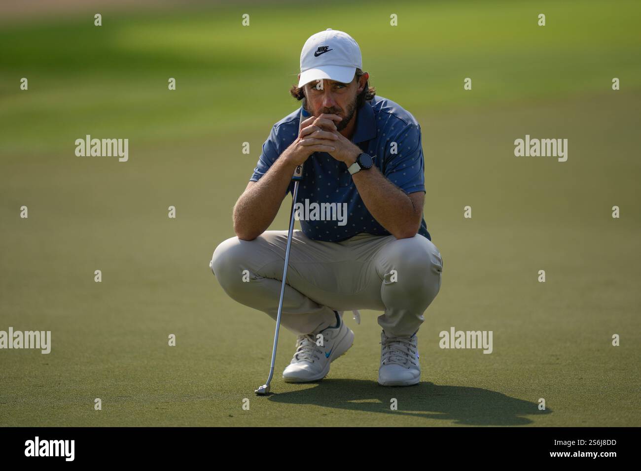 Tommy Fleetwood of England waits to play his shot on 7th green during