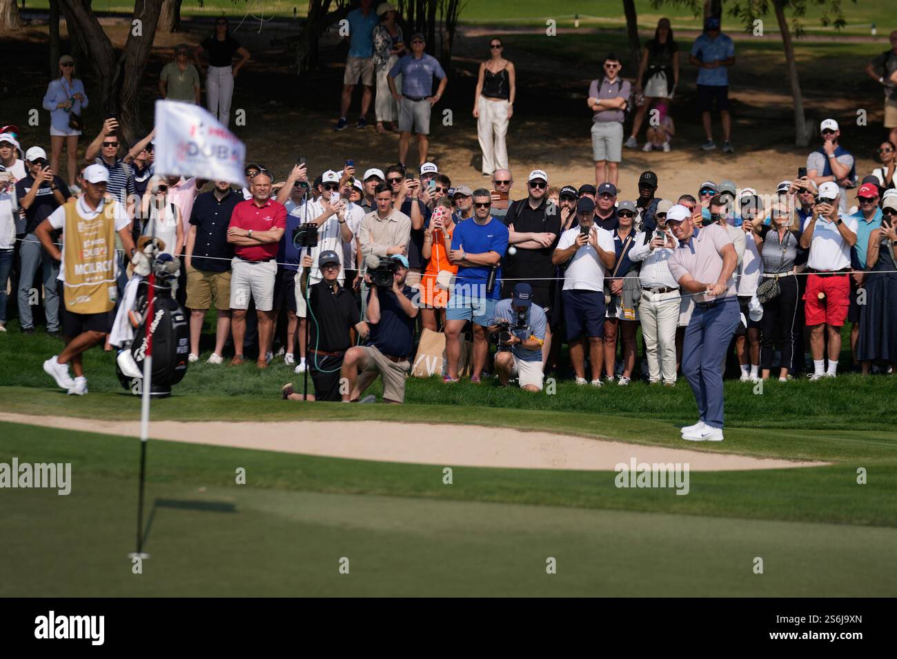 Rory McIlroy of Northern Ireland plays his third shot on the 6th hole