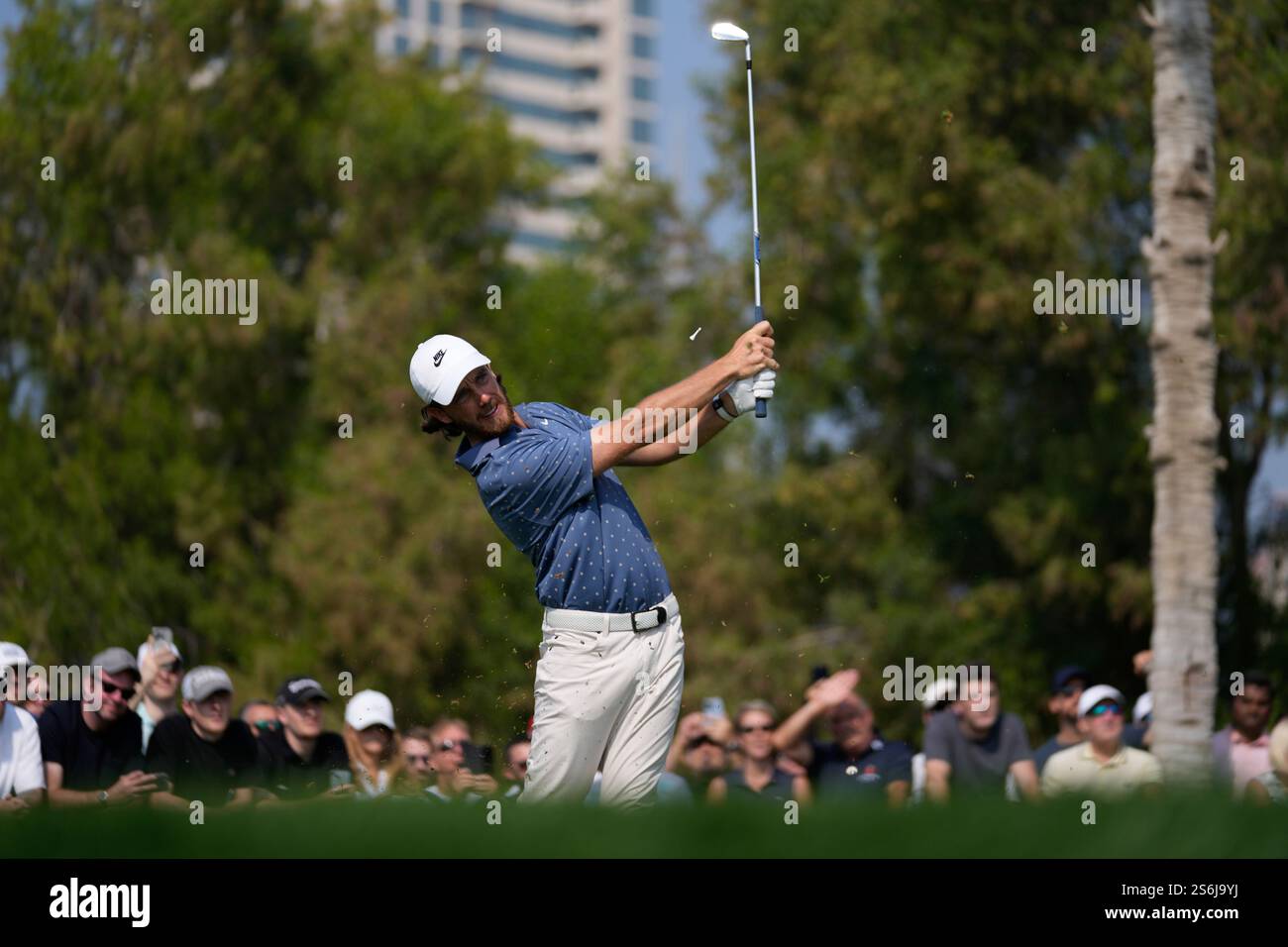 Tommy Fleetwood of England tees off at 6th hole during the second round