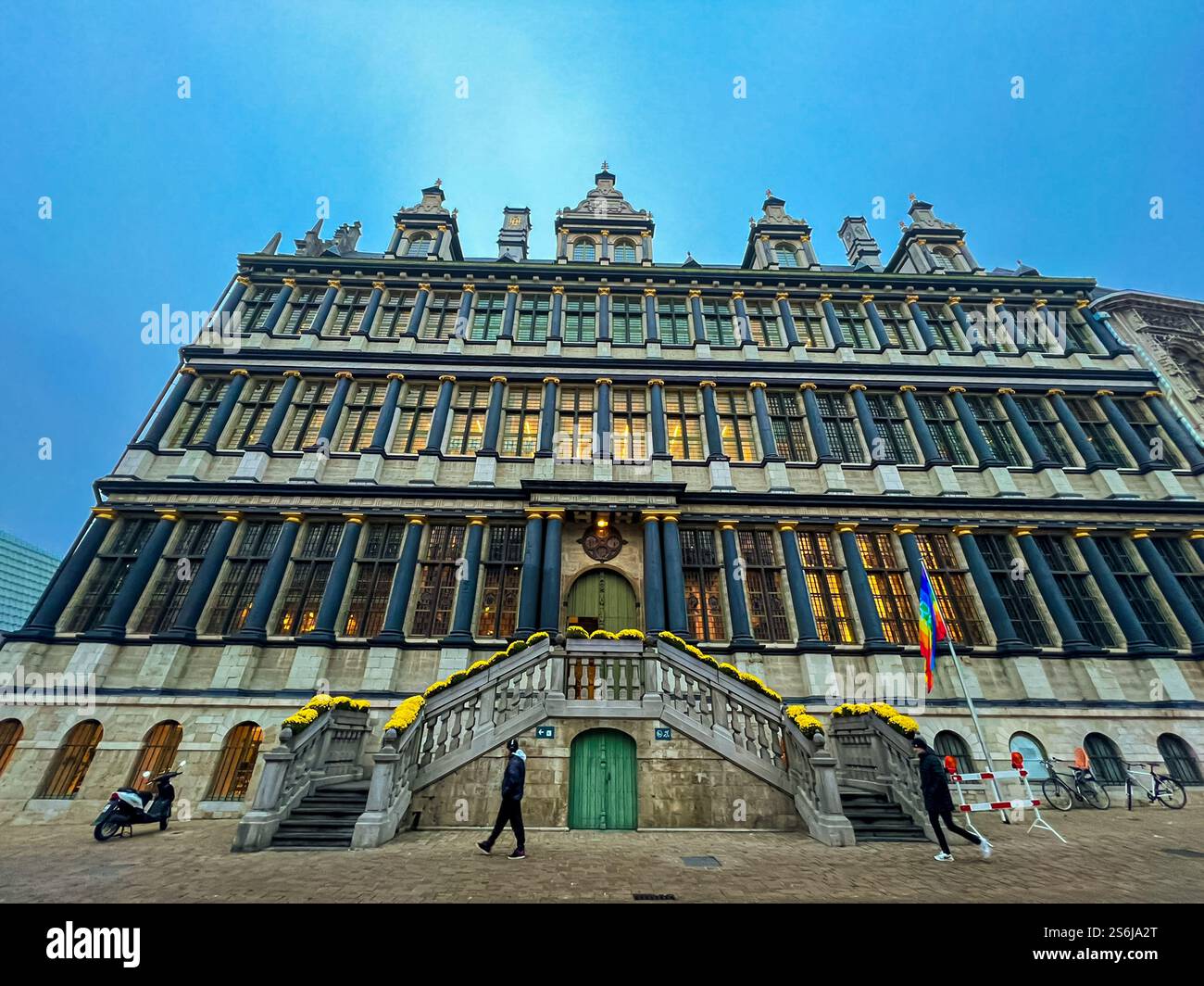 Historic city hall building of Ghent with staircase and arched windows ...