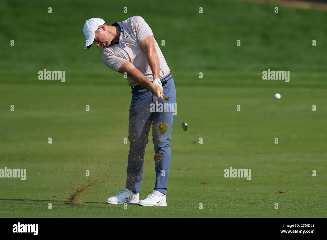 Rory McIlroy of Northern Ireland plays his second shot on the 9th hole