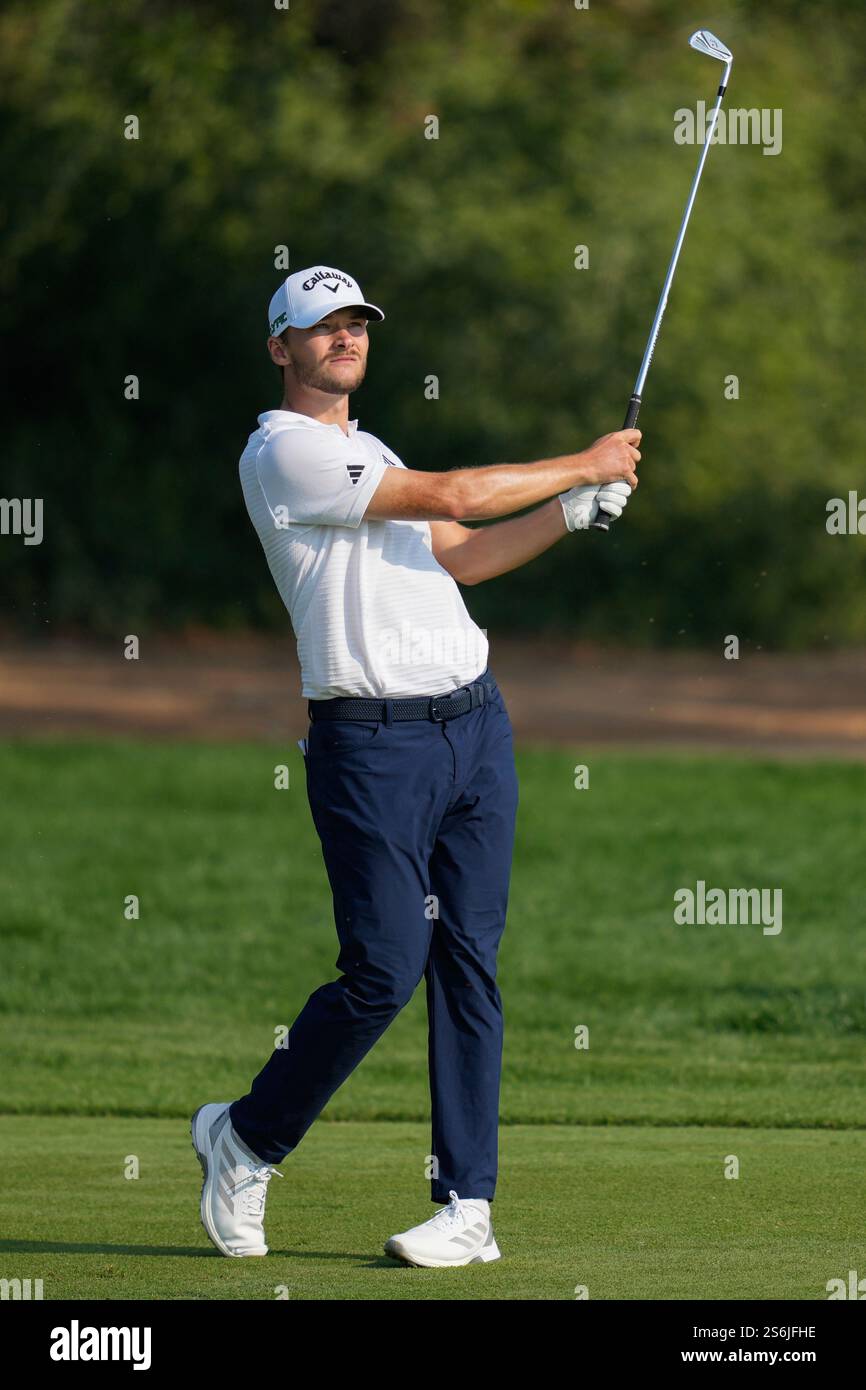 Nicolai Højgaard of Denmark watches after playing his second shot on