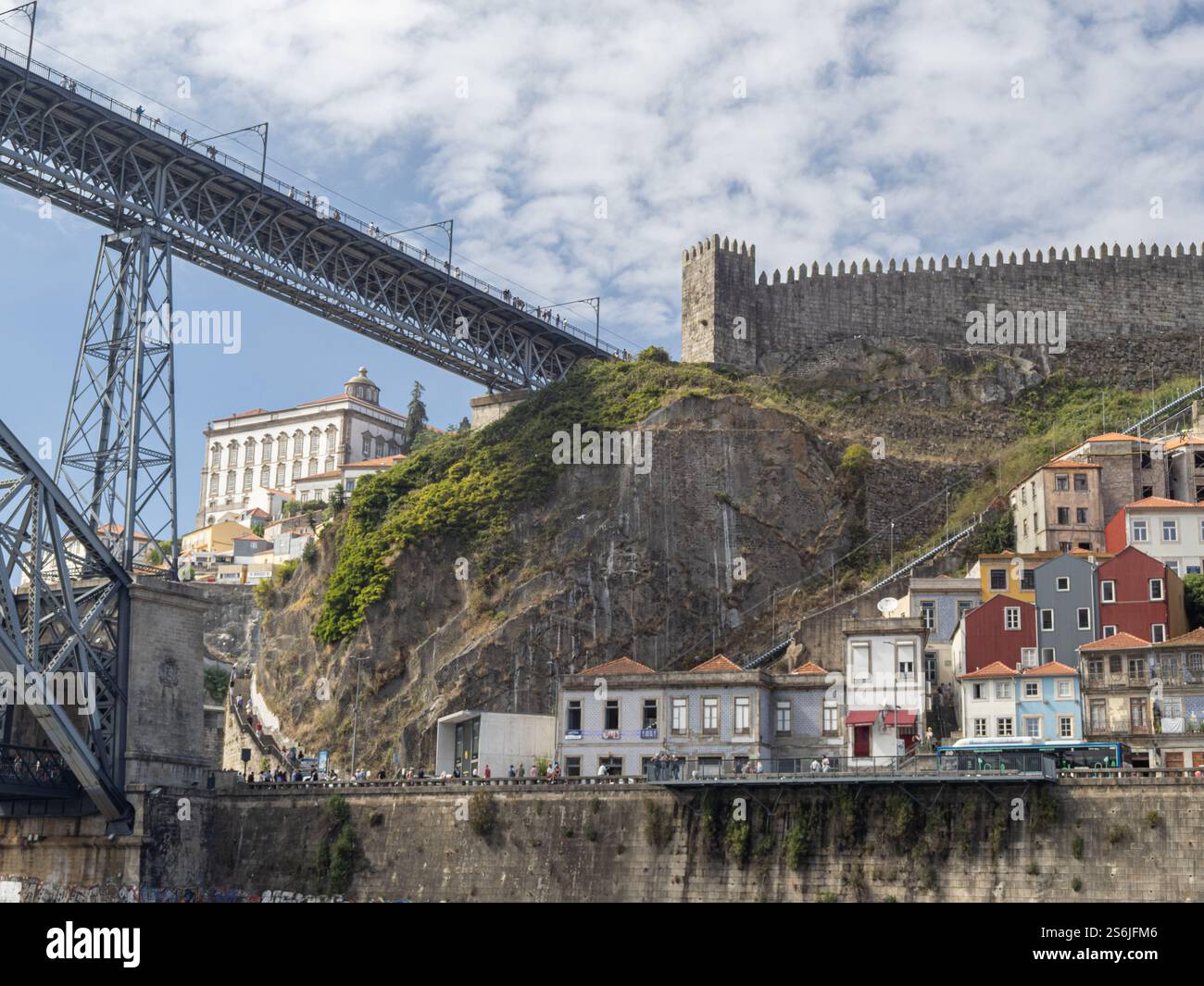 Dom Luis bridge and fortifications in Oporto Portugal from the Douro River Stock Photo
