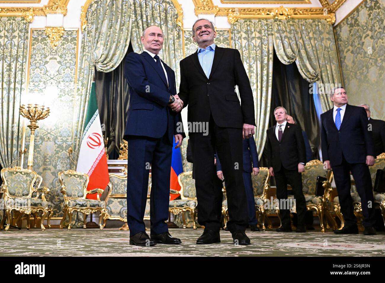 Russian President Vladimir Putin, left, and Iranian President Masoud Pezeshkian pose for a photo prior to their talks at the Kremlin in Moscow, Russia, Friday, Jan. 17, 2025. (Sergei Bobylev, Sputnik, Kremlin Pool Photo via AP) Stock Photo